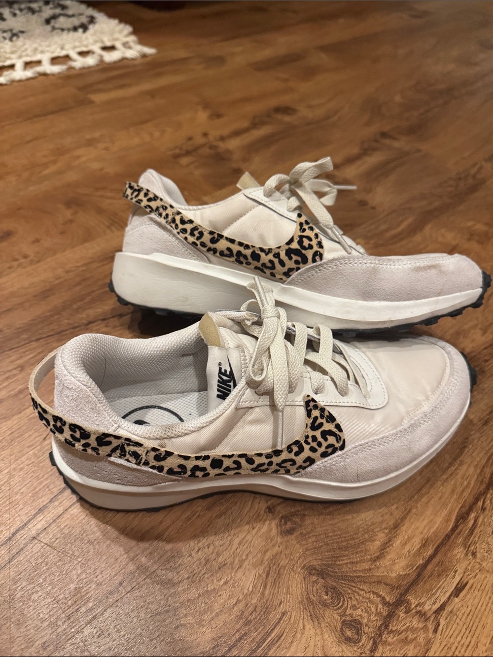 Nike Women's Cream Sneakers with Leopard Swoosh Accent